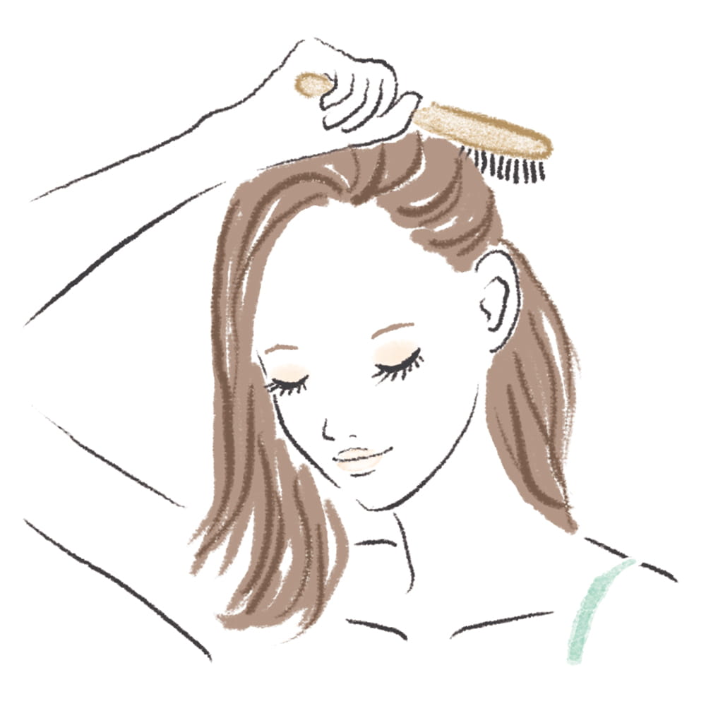 頭頂部に向かって多方向からとかす”