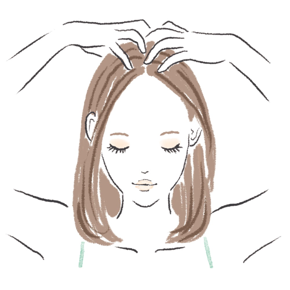 頭頂部に向かって円を描くように”